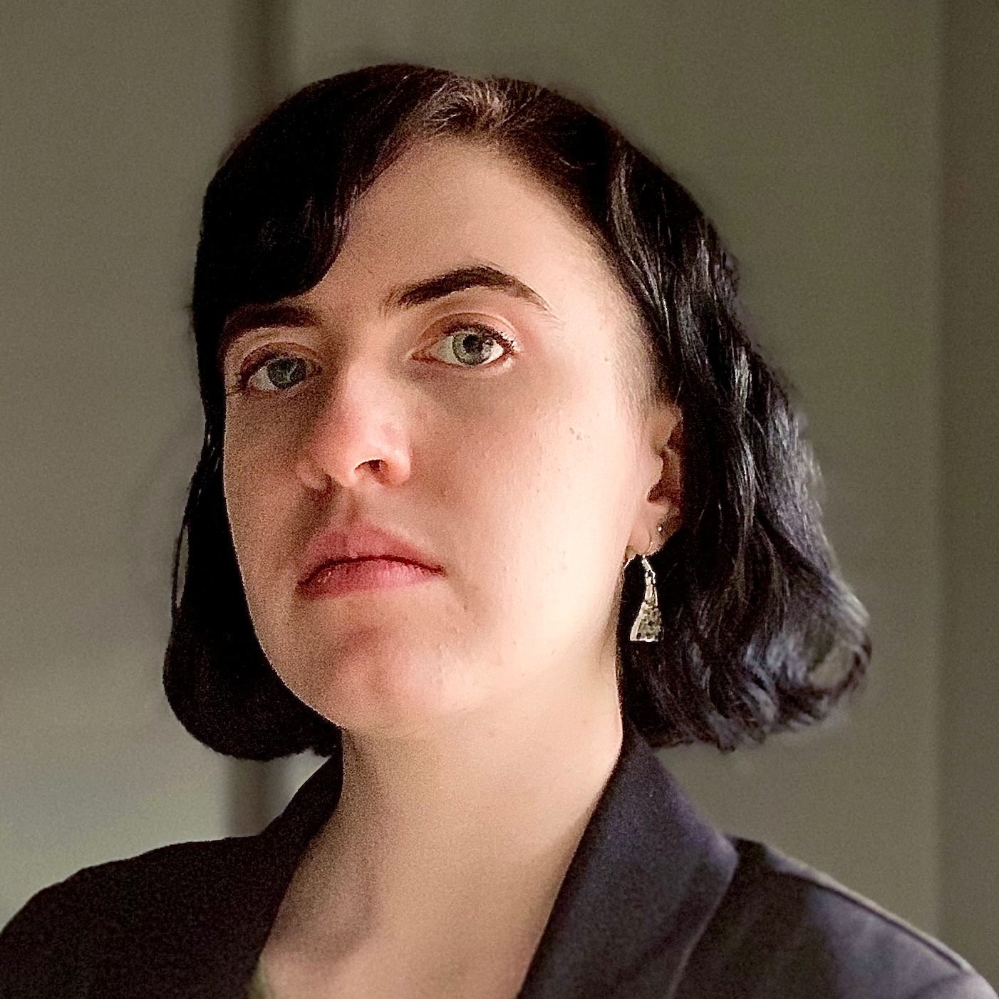 A professional headshot of Miranda Price